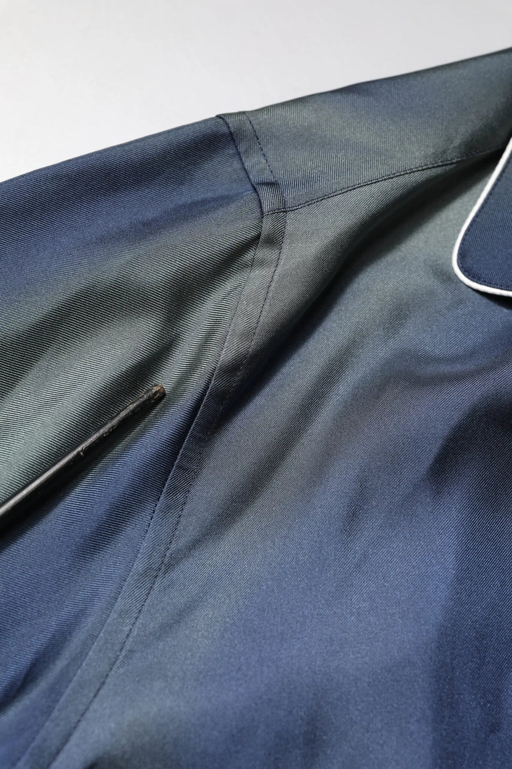 Navy blue satin pajama top with white piping along the collar from Dolce & Gabbana multicolor lounge sleepwear shirt