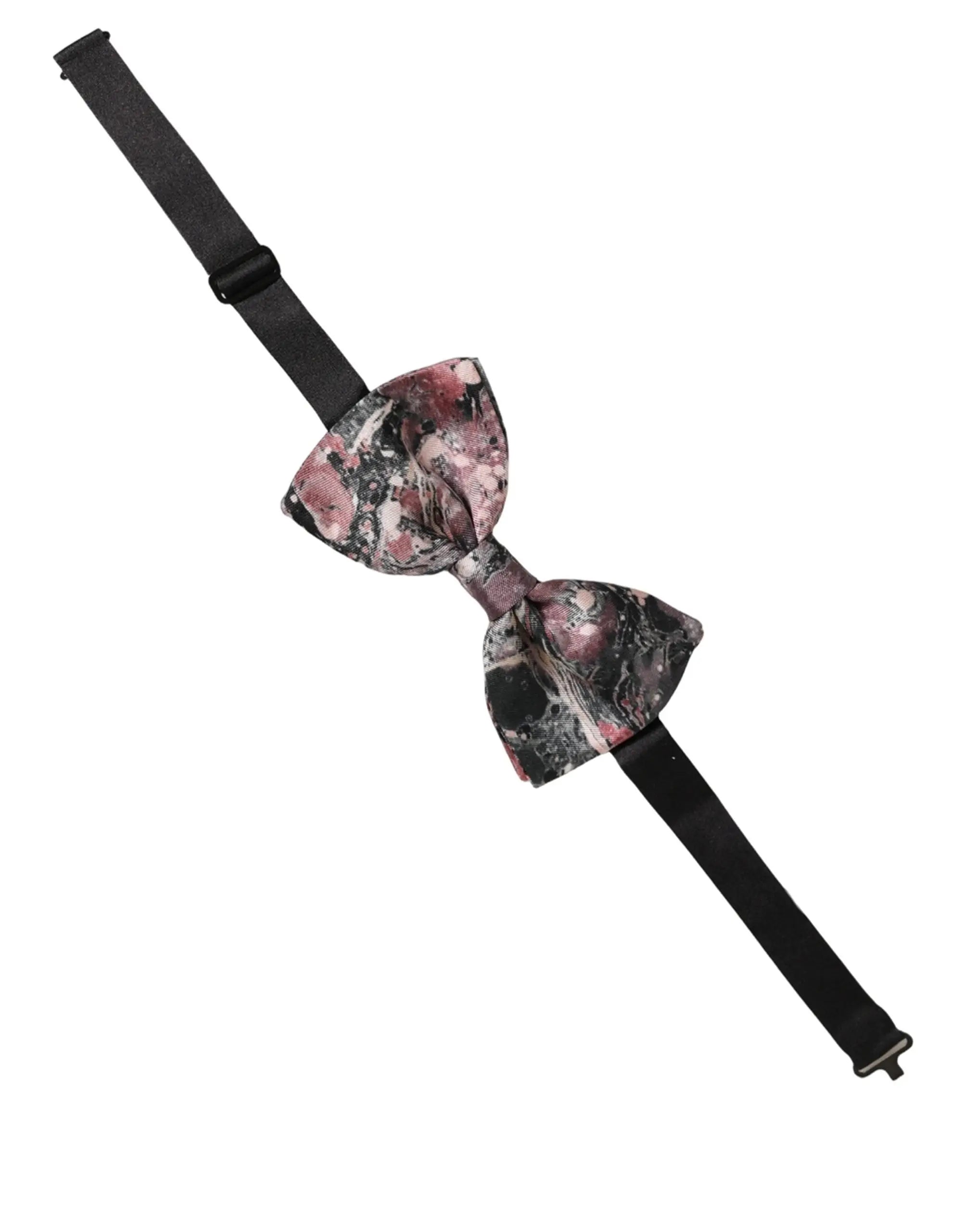 Un noeud papillon dolce & gabbana en soie marbrée rose et noir avec sangles réglables en tissu noir