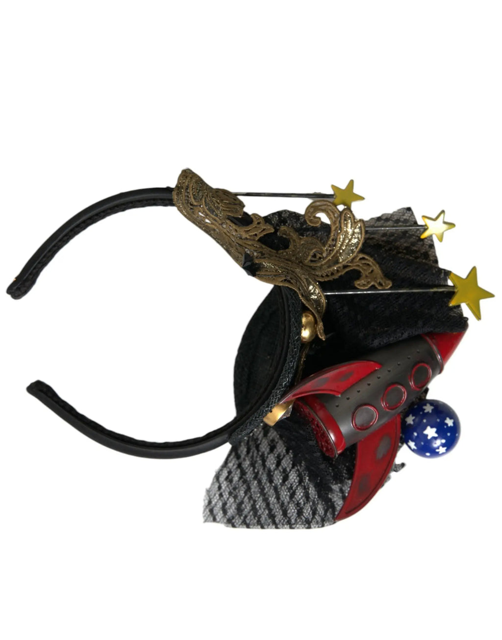 Headband dolce gabbana noir avec ornement dragon doré, fusée rouge et grise, balle bleue étoilée et étoiles jaunes