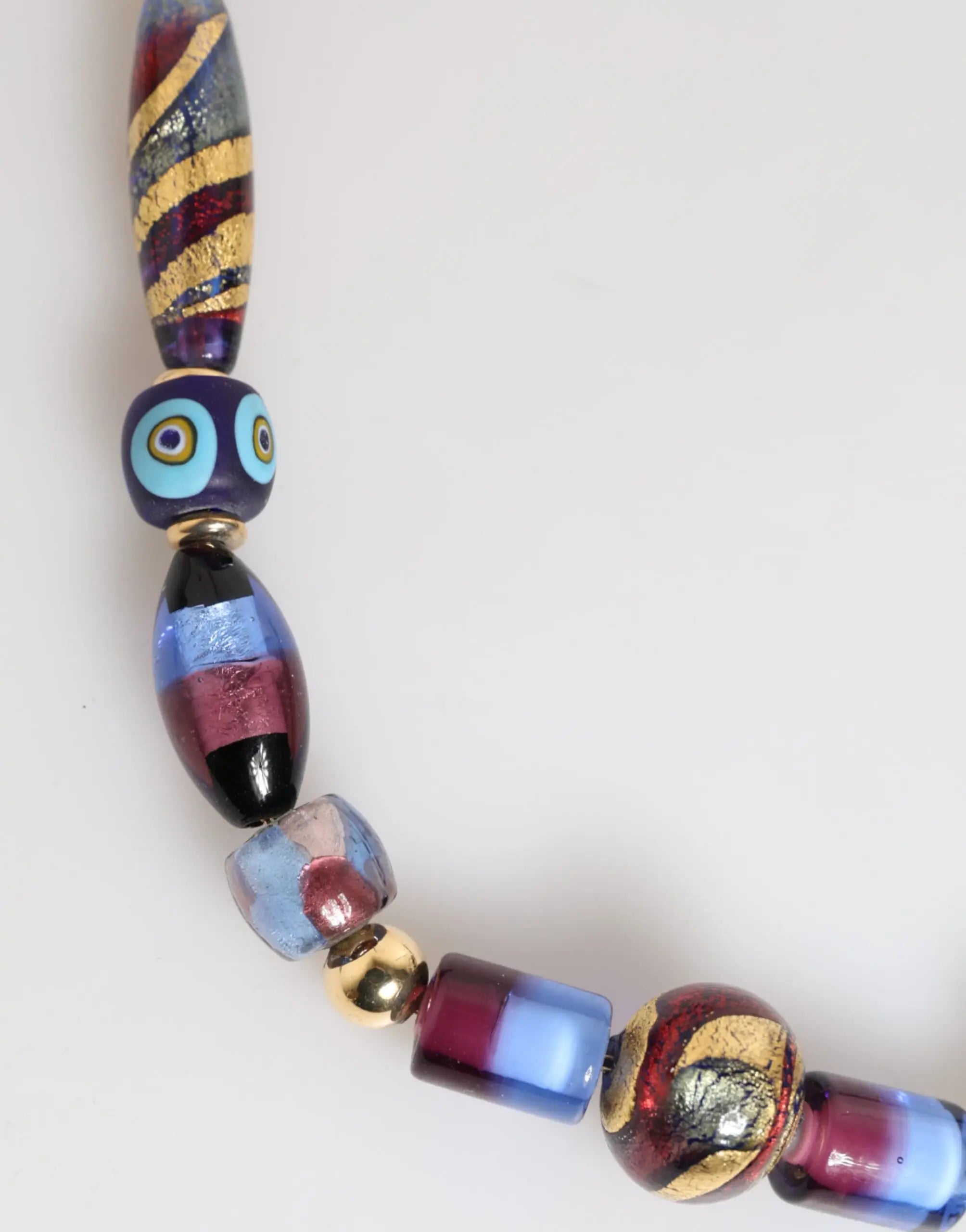 Collier dolce & gabbana en perles de verre murano multicolores avec chaîne en laiton doré et perle en forme de hibou