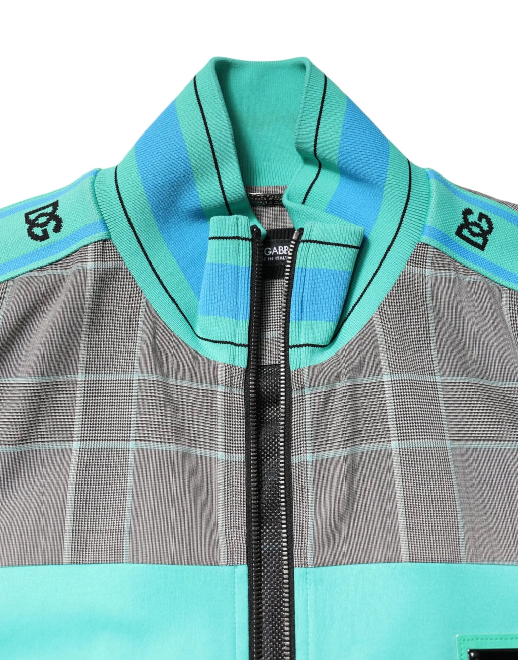 Dolce & Gabbana multicolor plaid full zip windbreaker jacket with gray fabric body and teal blue striped knit collar with black logos