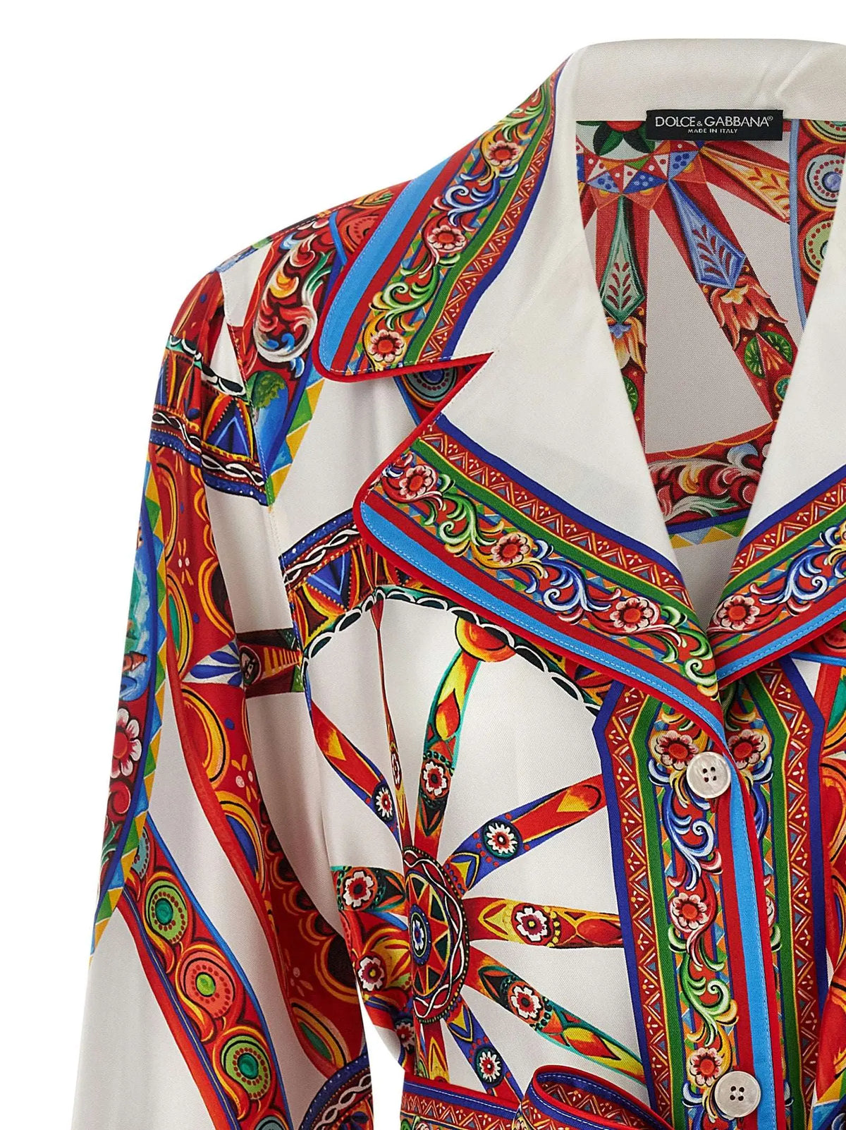 Blouse dolce gabbana en soie multicolore avec motifs géométriques et floraux rouges bleus et verts sur fond blanc