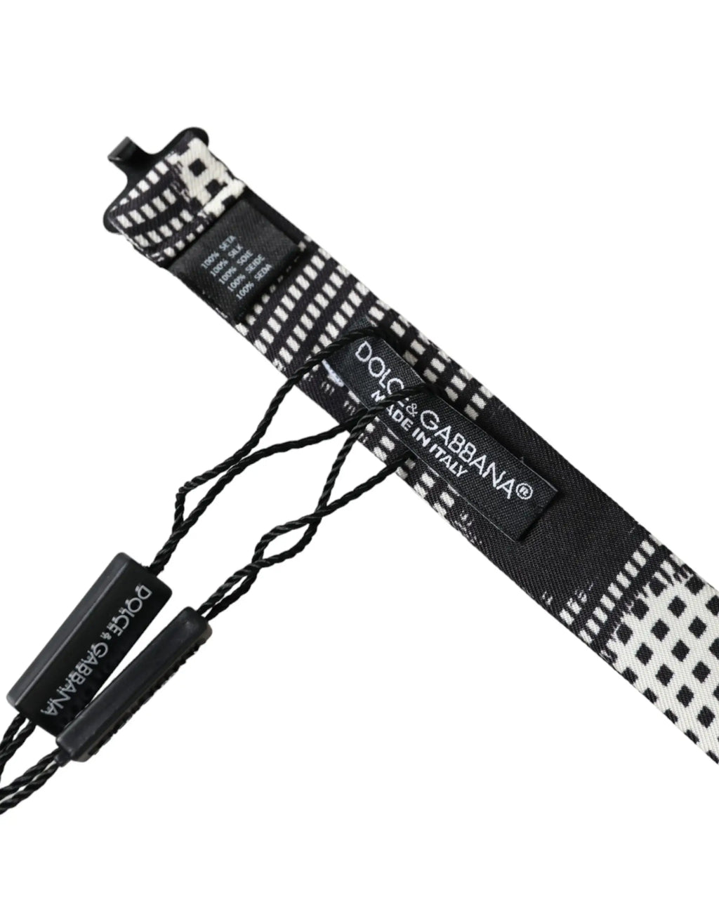 Bracelet de poignet dolce & gabbana noir et blanc à motifs géométriques avec étiquettes de marque
