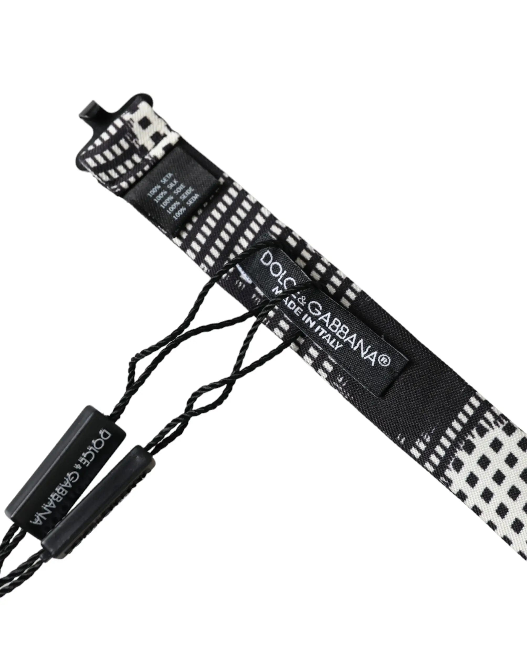 Bracelet de poignet dolce & gabbana noir et blanc à motifs géométriques avec étiquettes de marque