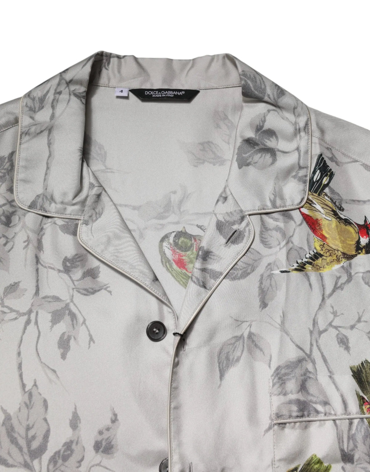 Dolce gabbana chemise boutonnée en soie multicolore avec imprimé d oiseaux et de feuilles aux tons doux