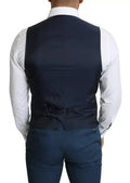 Dolce & Gabbana veste homme bleu marine en tissu taillé avec légère brillance et boucle de ceinture assortie