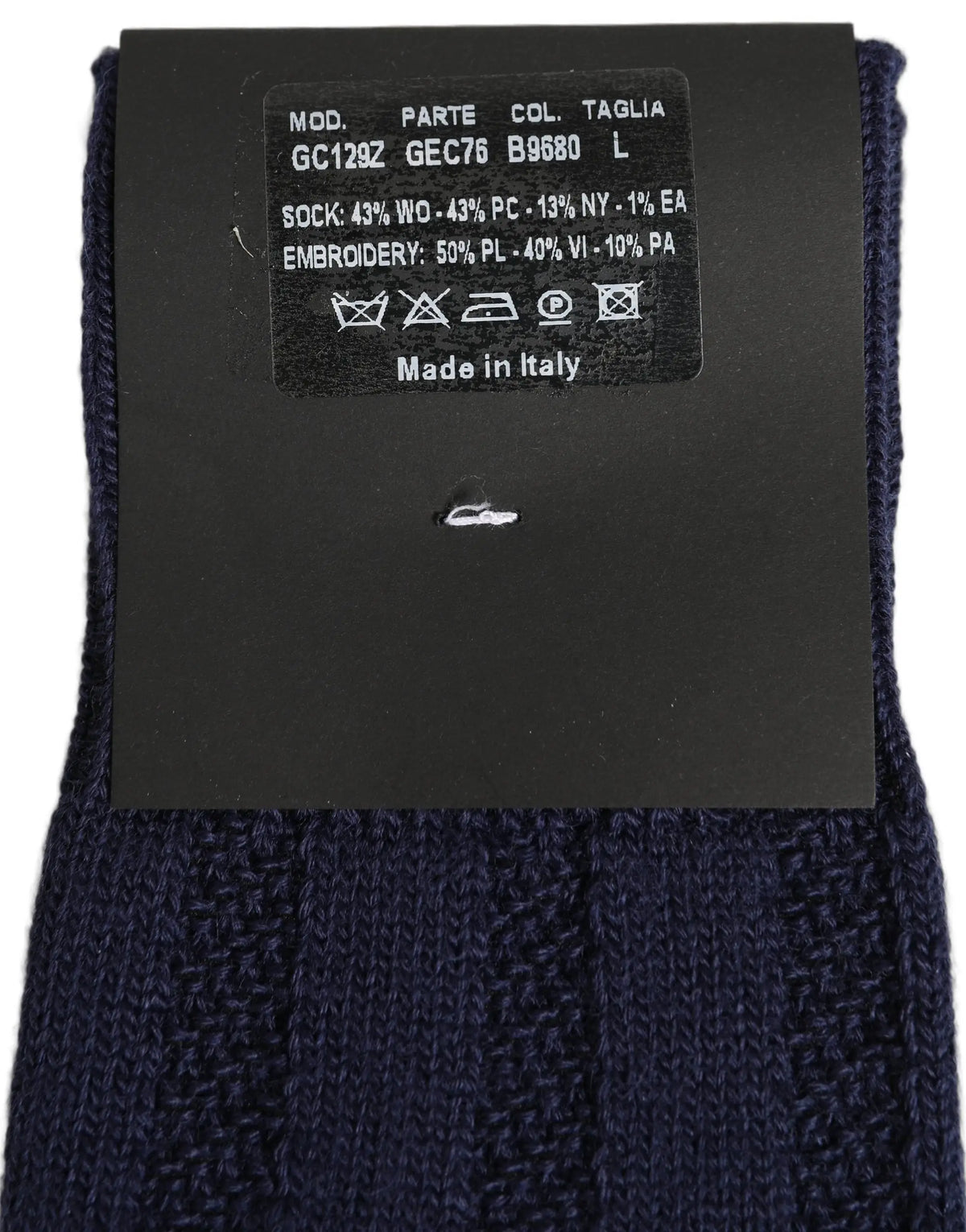 Chaussette accessoire genou en laine bleu marine dolce & gabbana avec texture côtelée et étiquette d entretien noire