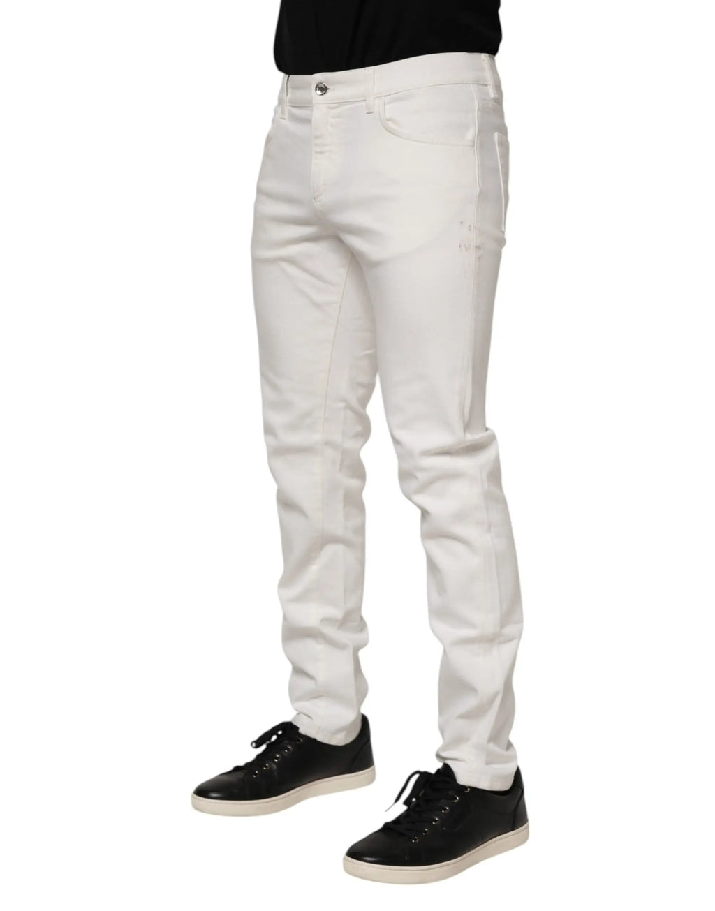 Jeans slim fit en denim stretch coton off white blanc avec légères déchirures par Dolce & Gabbana