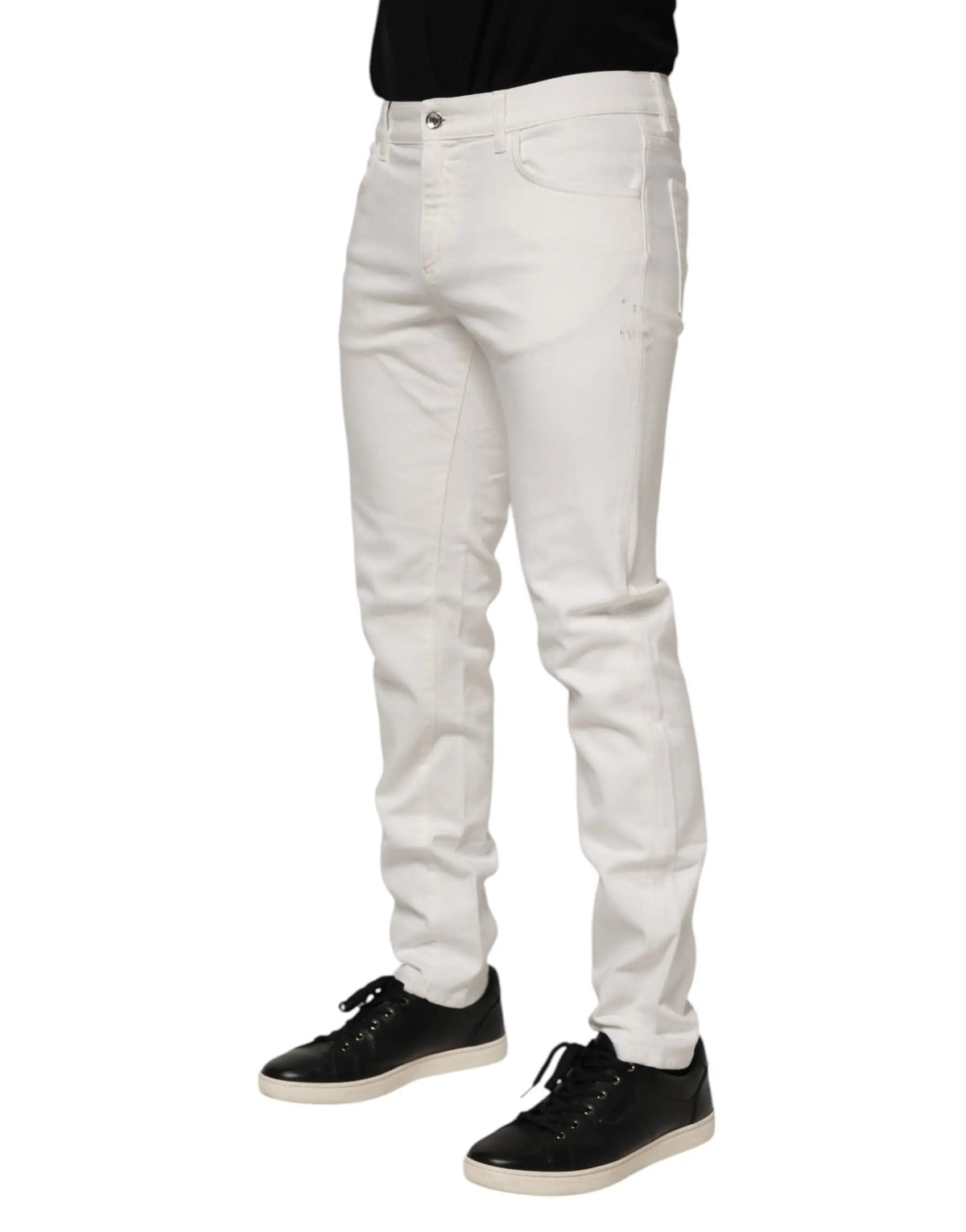 Jeans slim fit en denim stretch coton off white blanc avec légères déchirures par Dolce & Gabbana