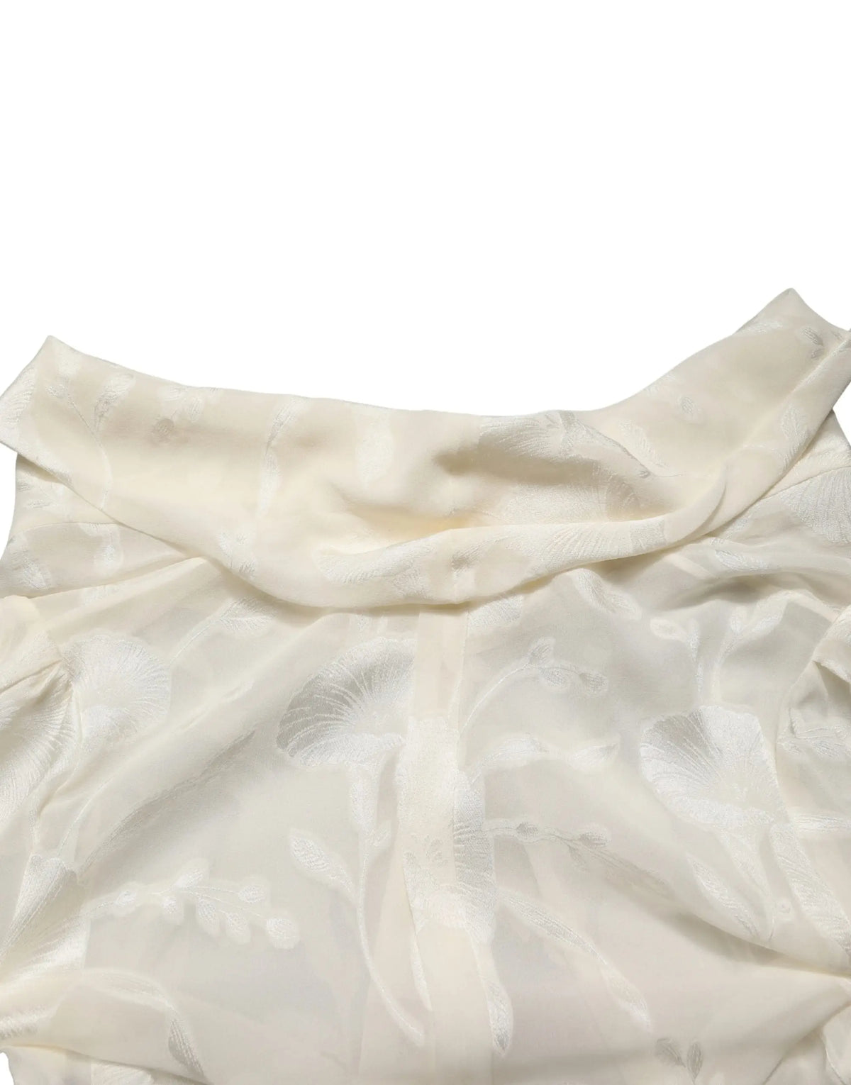 Blouse délicate blanche cassée dolce & gabbana en soie semi-transparente avec broderie florale subtile