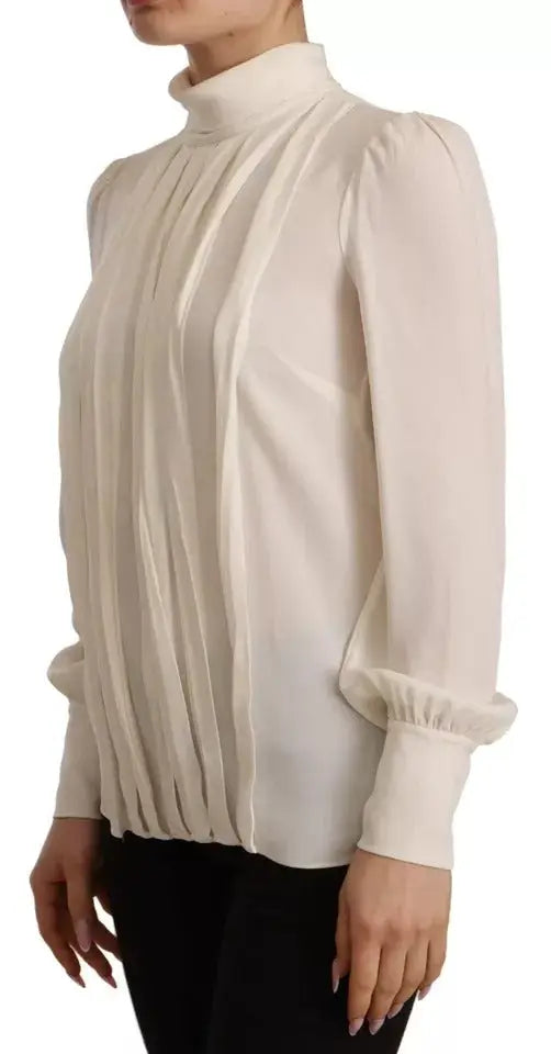 Blouse dolce & gabbana crème en soie col roulé à manches longues avec tissu plissé transparent et manches bouffantes