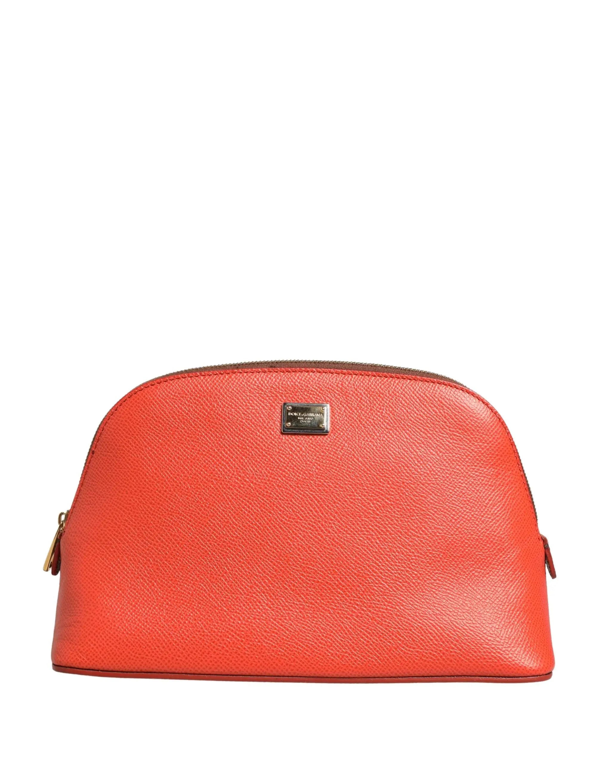 Sac cosmétique vibrant orange en cuir texturé dolce & gabbana avec plaque métallique et fermeture éclair dorée