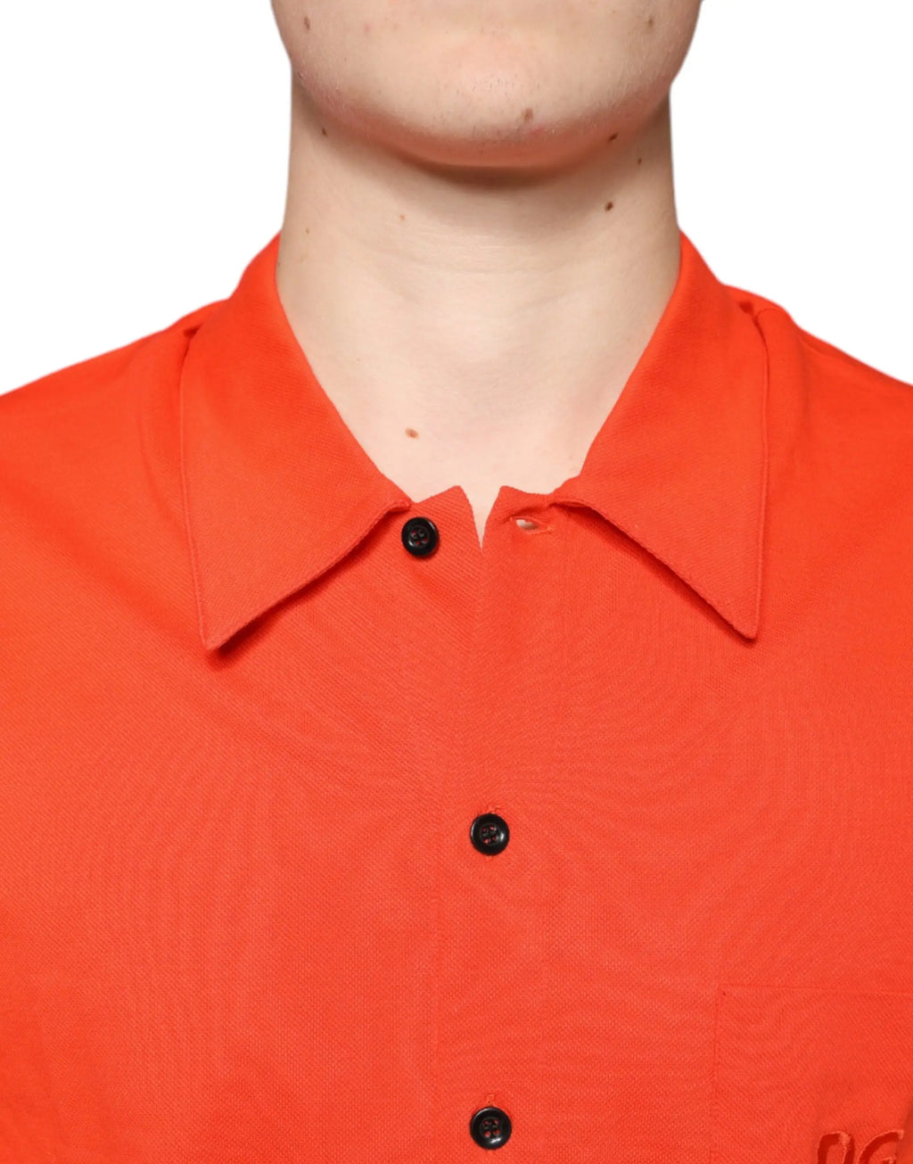 Polo décontracté dolce & gabbana orange en coton avec boutons noirs et tissage texturé subtil