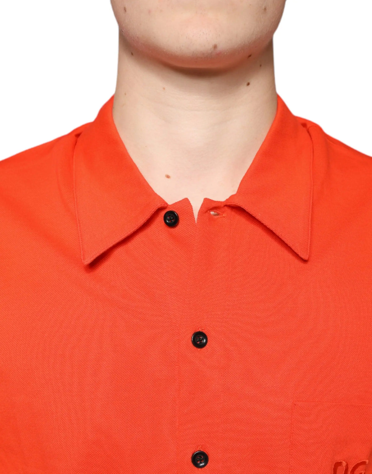 Polo décontracté dolce & gabbana orange en coton avec boutons noirs et tissage texturé subtil