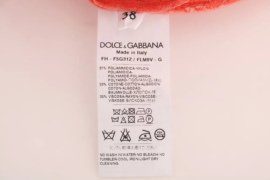 Étiquette d entretien en maille orange dolce gabbana pour blouse en dentelle florale avec boutons crystal