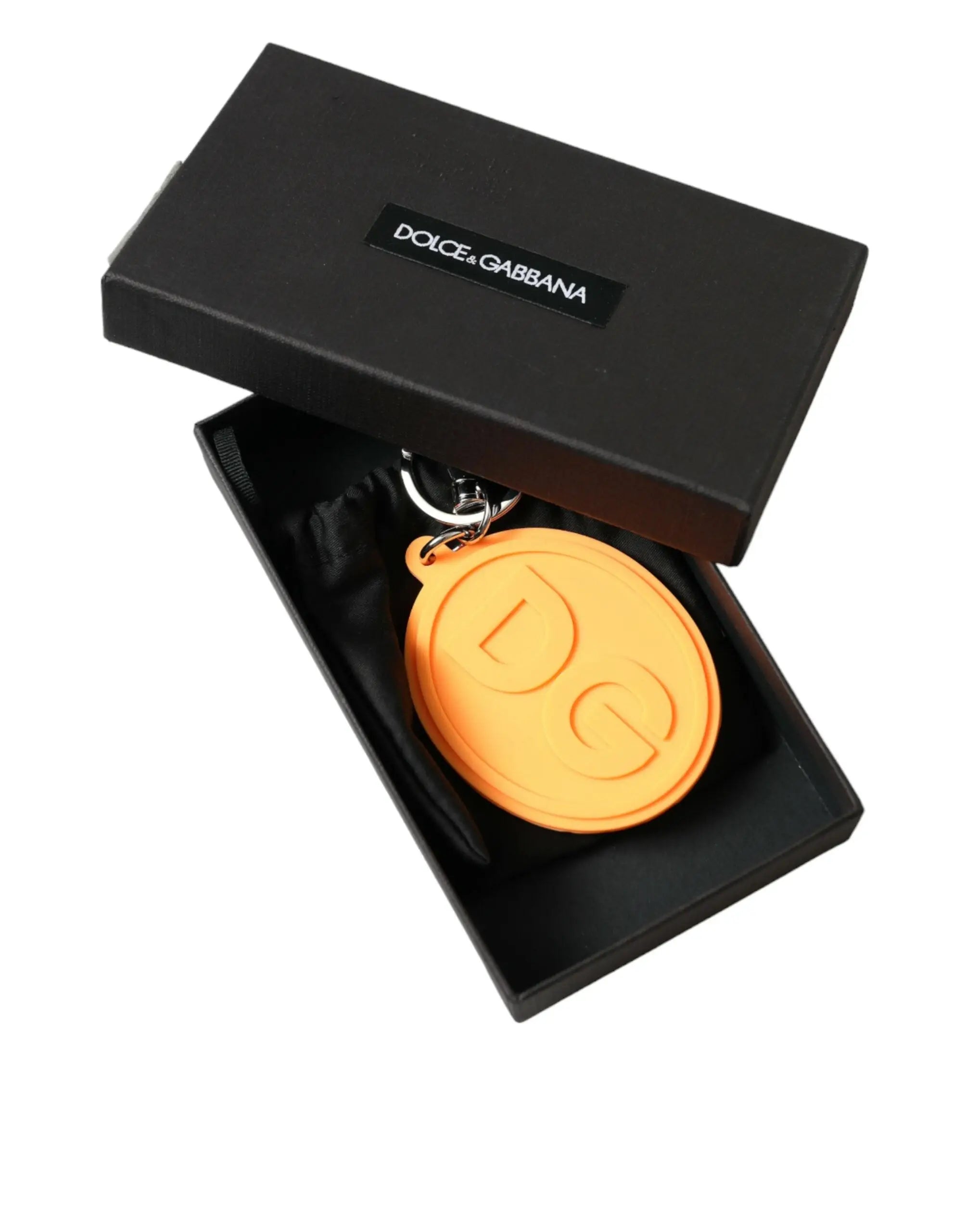 Dolce & gabbana porte-clés orange en caoutchouc avec logo dg embossé présenté dans un coffret noir