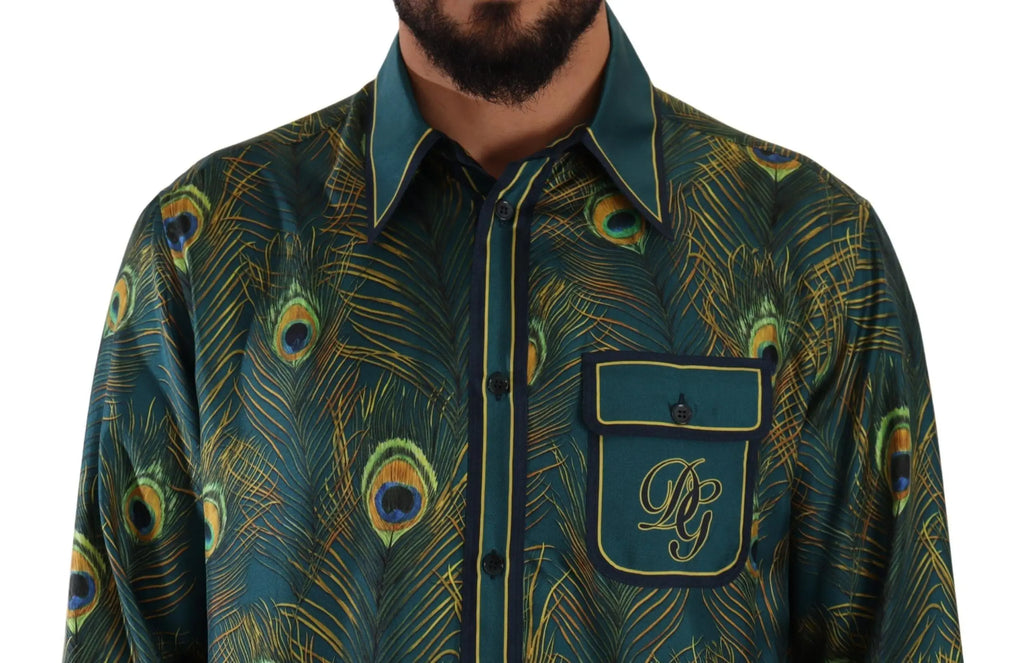 Chemise homme dolce & gabbana en soie teal avec imprimé plumes de paon, boutons et poche brandée avec bordure dorée