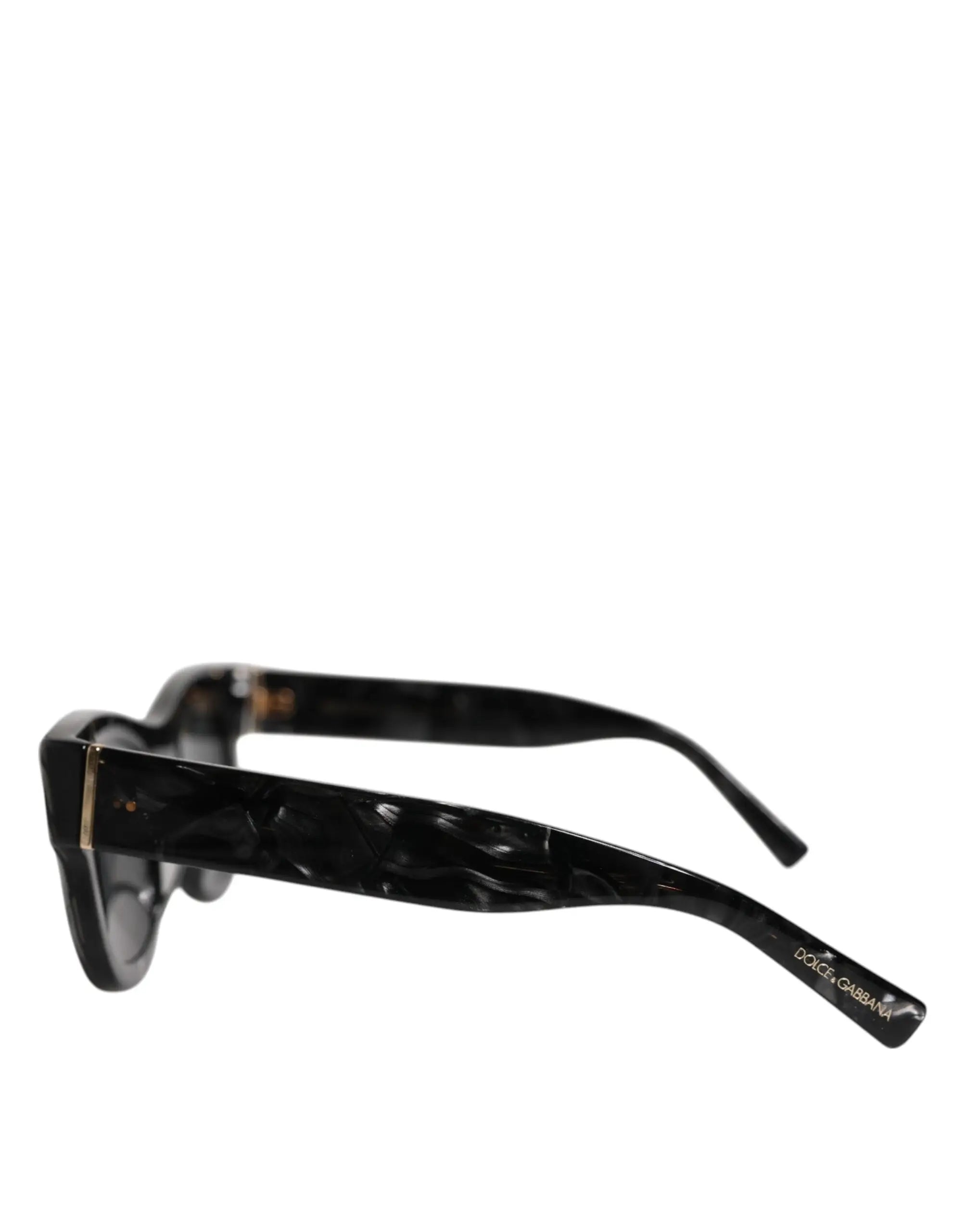 Lunettes de soleil dolce & gabbana domenico en acétate écaille noire avec accents métalliques dorés design moderne