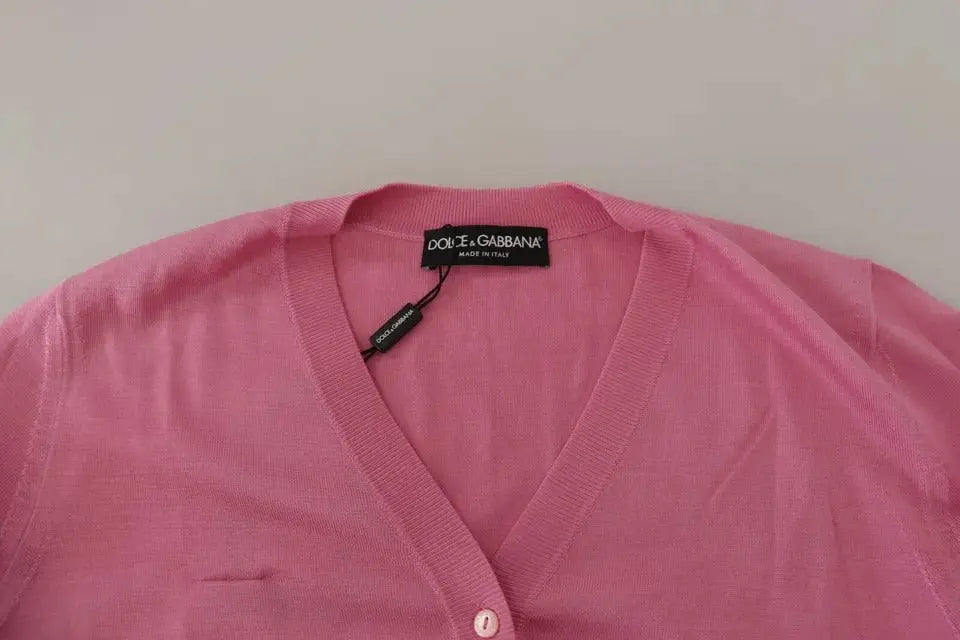 Cardigan dolce & gabbana rose doux en soie 100 pour cent avec col en v et fermeture par boutons