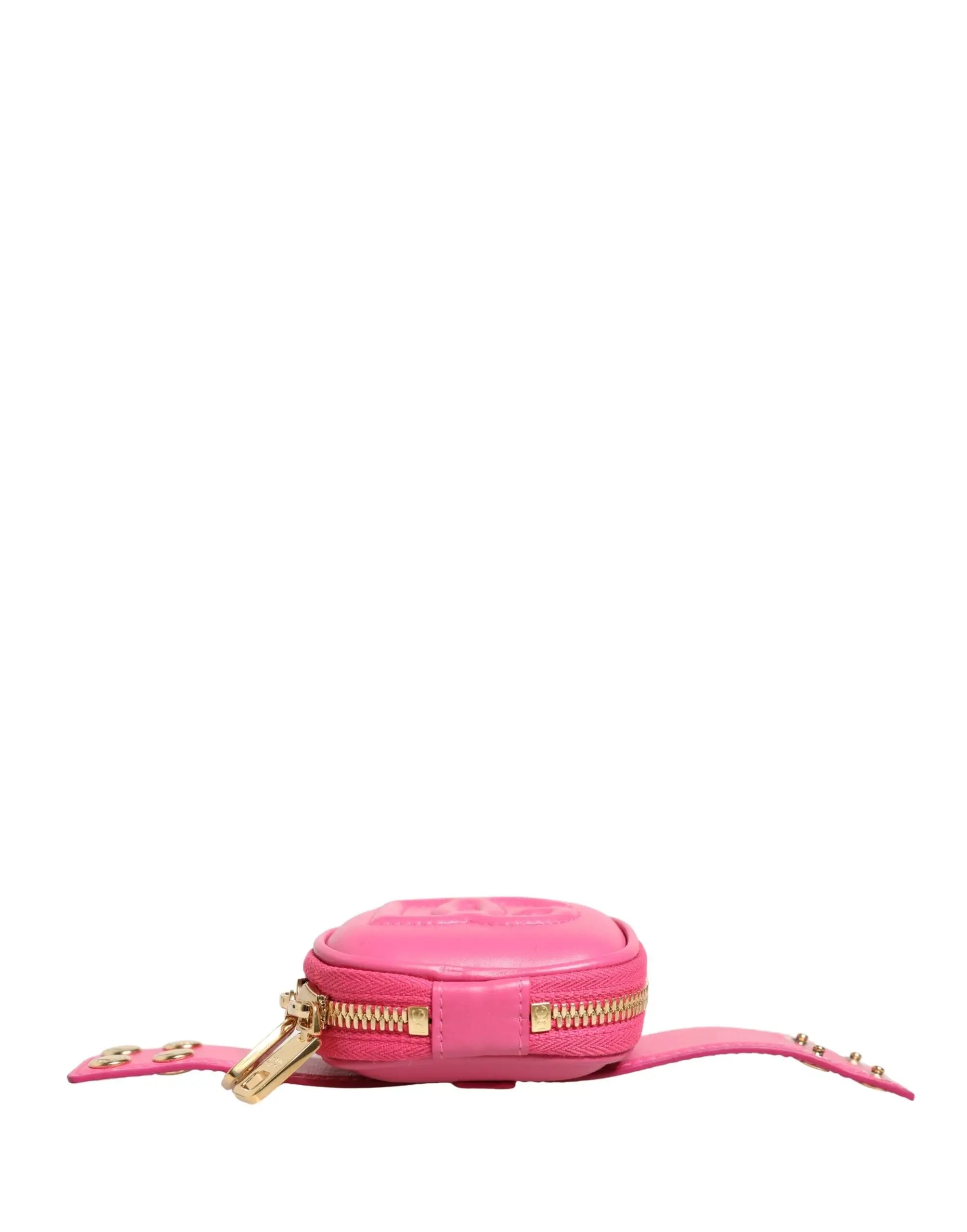 Dolce & gabbana sac ceinture rond rose en cuir de veau avec fermeture dorée et bandoulières cloutées multifunctionnel