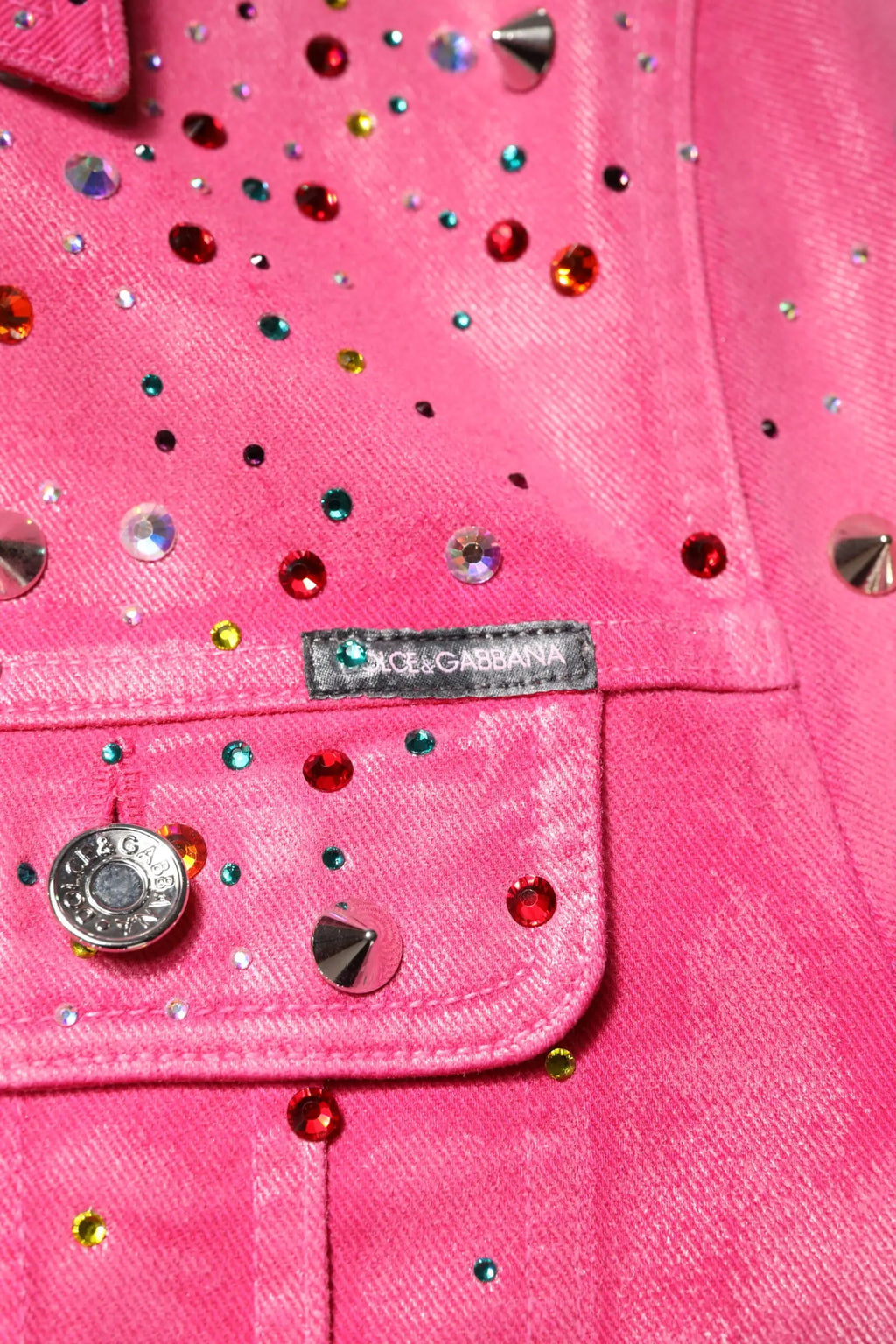 Veste en denim rose dolce & gabbana ornée de cristaux colorés et clous métalliques en coton