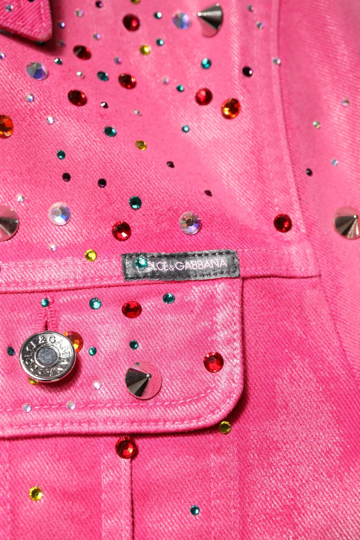 Veste en denim rose dolce & gabbana ornée de cristaux colorés et clous métalliques en coton