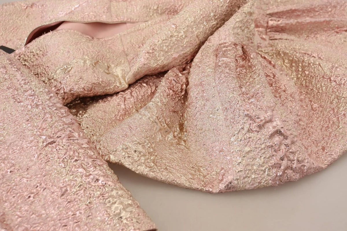 Tissu rose gold brillant texturé avec motif jaquard complexe pour robe midi dolce & gabbana manches 34