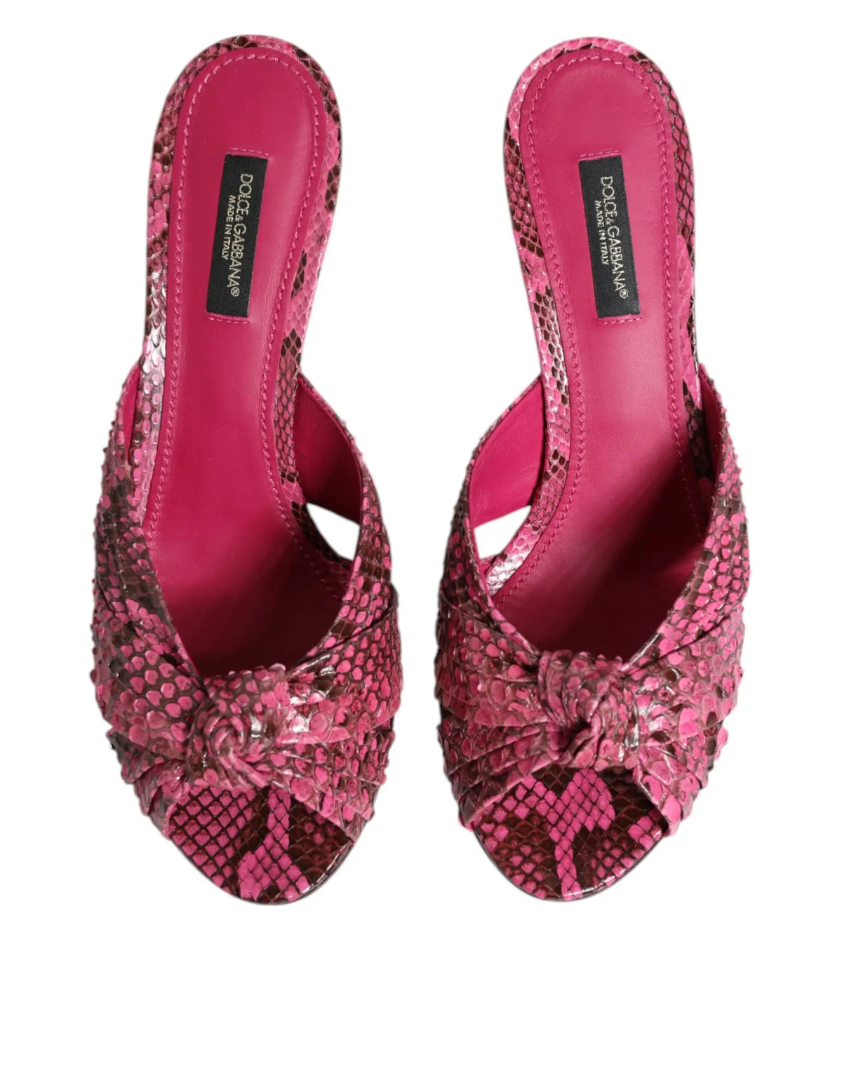 Mules dolce & gabbana en cuir rose avec imprimé serpent et détail noué à l’avant