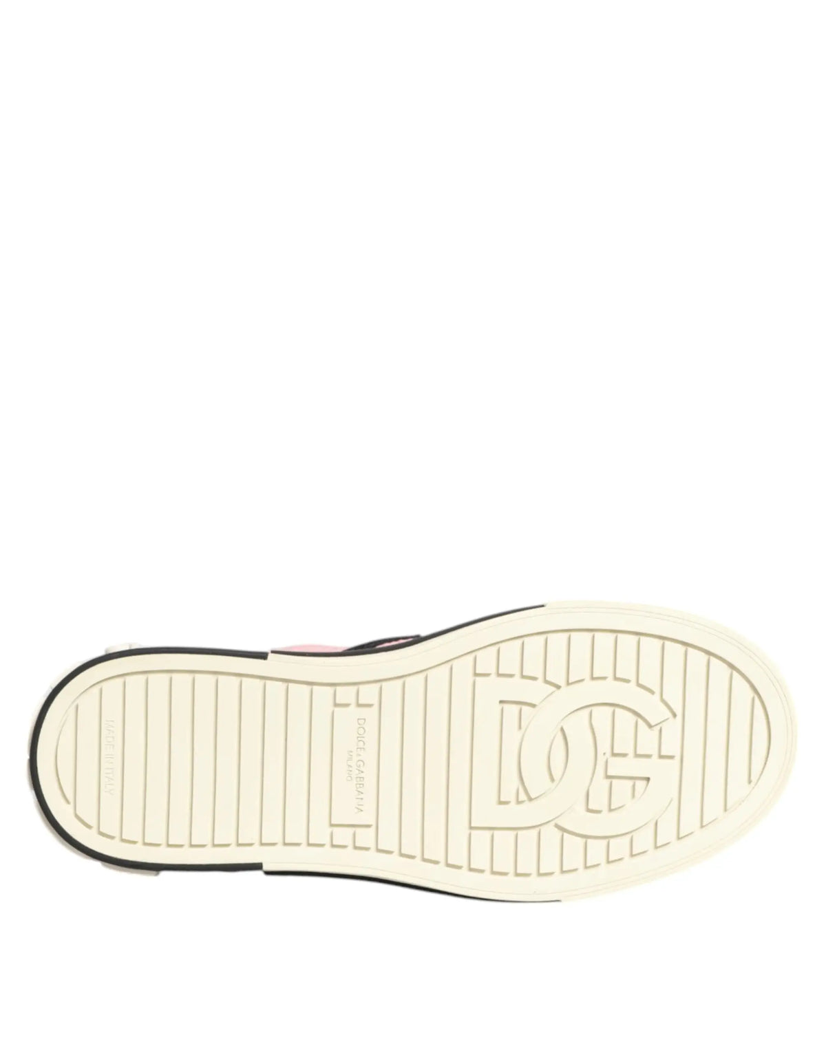 Semelle blanche en caoutchouc avec bord noir et logo dc shoes embossé sur des baskets slip-on dolce gabbana rose en nylon matelassé