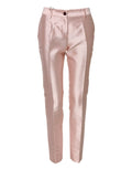 Un pantalon dolce & gabbana en satin rose blush avec coupe ajustée et plis subtils à la taille