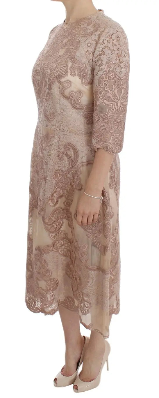 Robe Dolce & Gabbana rose en dentelle de soie avec broderie florale délicate et ourlet asymétrique fluide