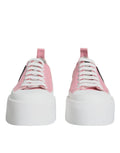 Baskets basses dolce gabbana en toile rose avec lacets blancs et semelle plateforme épaisse blanche