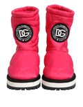 Bottes mi-mollet rembourrées en viscose rose vif dolce gabbana avec semelle noire et blanche et logo circulaire sur le côté