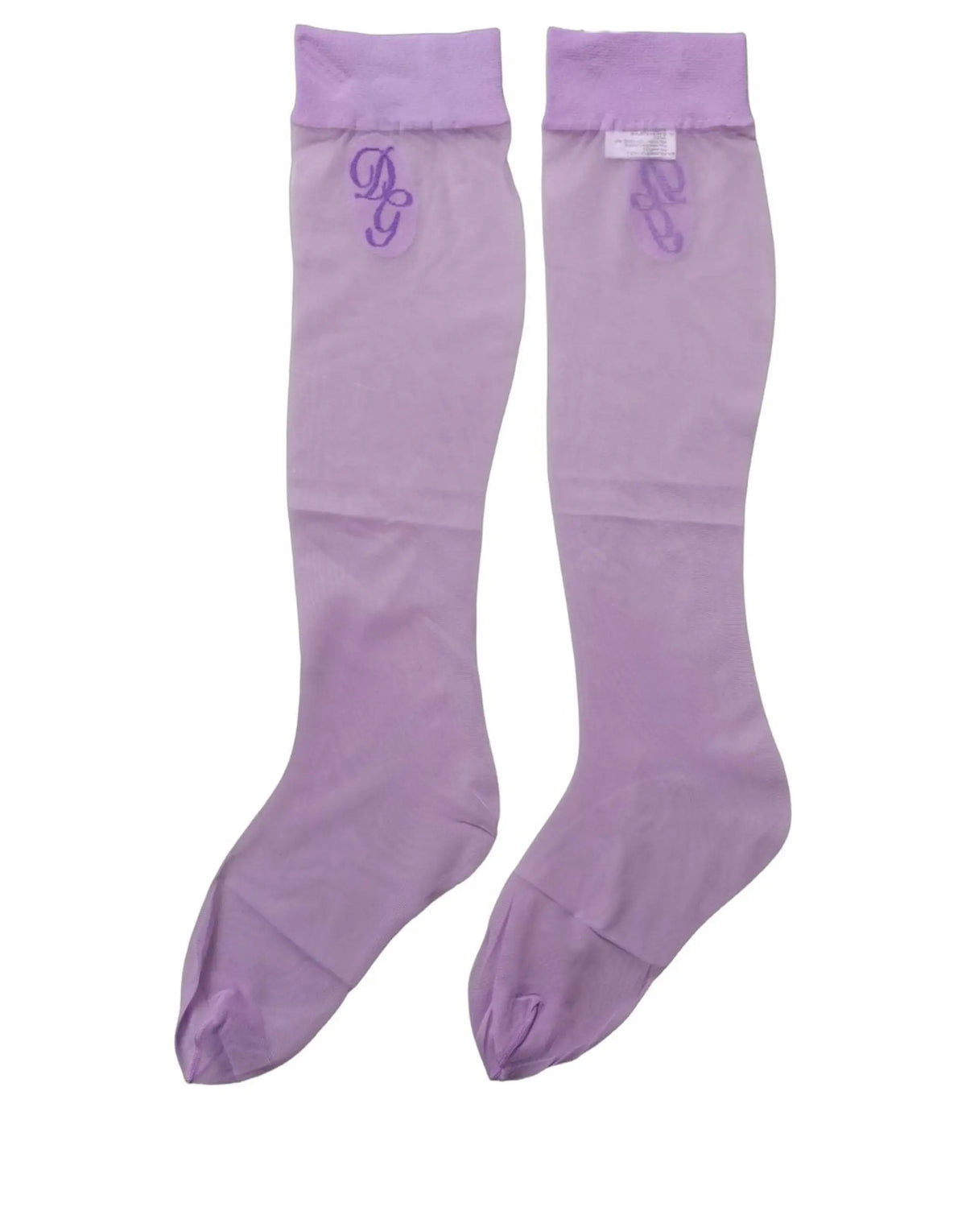 Une paire de chaussettes violettes dolce & gabbana mi-hautes en nylon transparent avec un monogramme brodé subtil