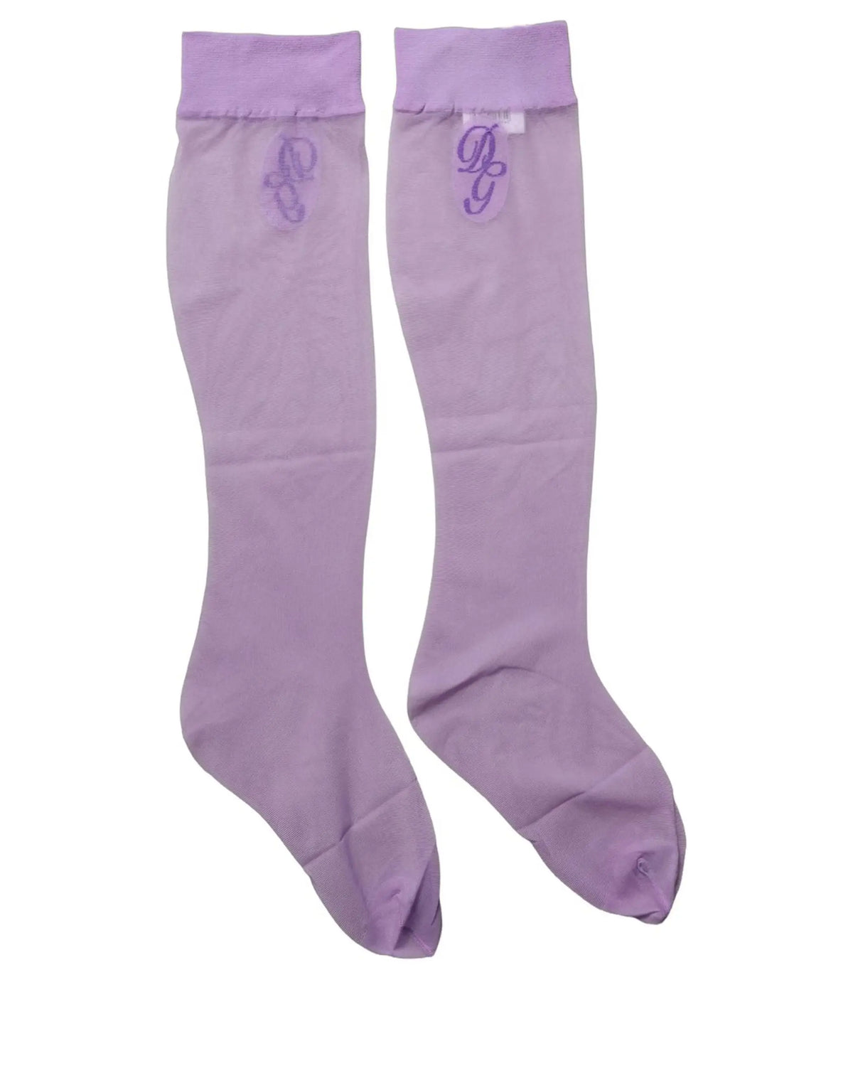 Une paire de chaussettes dolce & gabbana violet genou en nylon transparent avec un monogramme brodé subtil