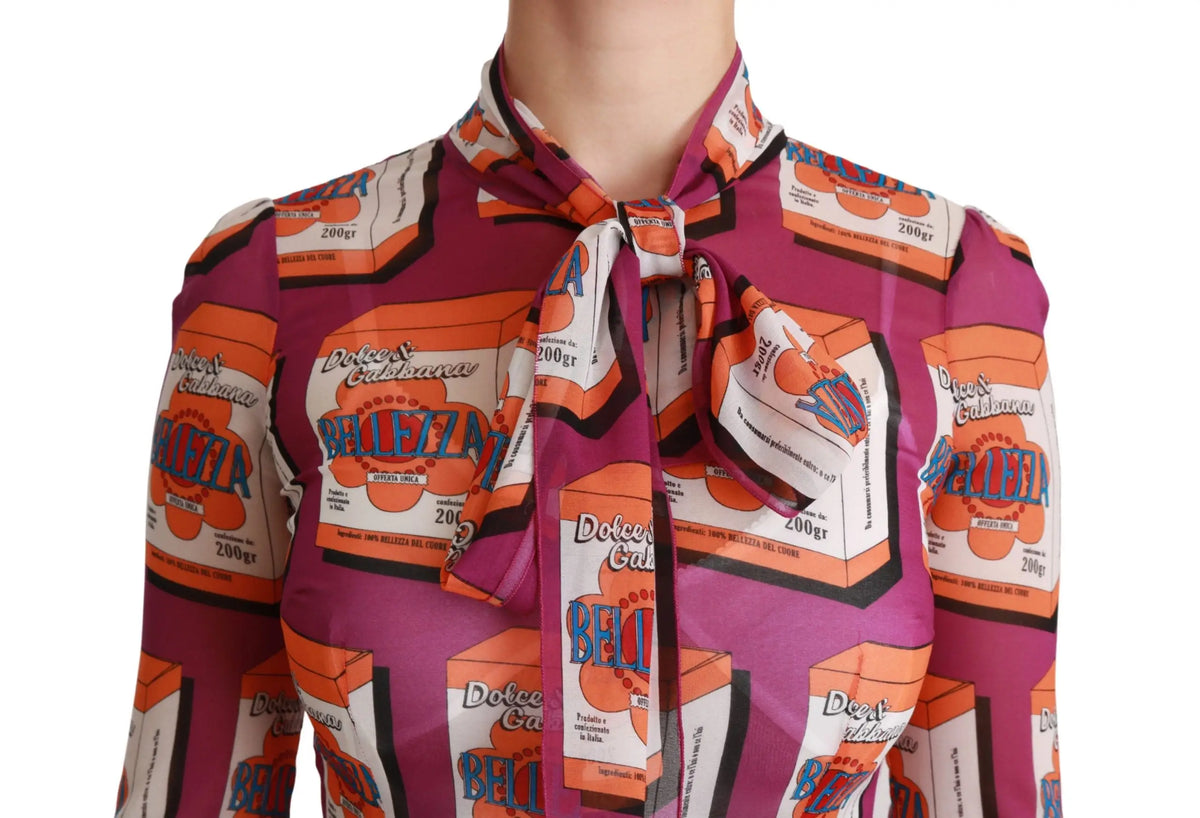 Vêtement dolce & gabbana en soie magenta avec imprimé audacieux des boîtes de bonbons bellezza orange et blanc