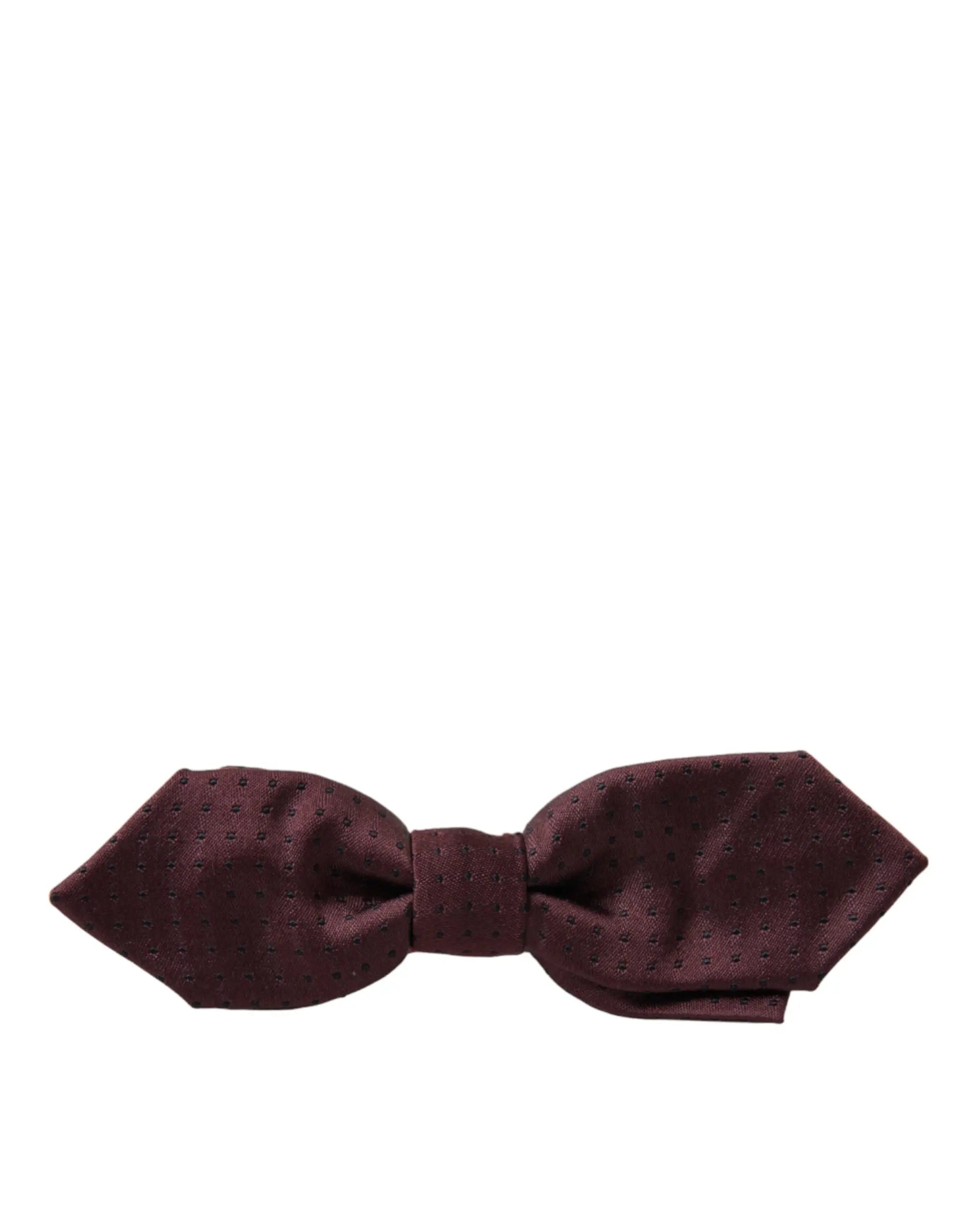 Un nœud papillon dolce & gabbana en soie rouge bordeaux avec une texture subtilement à pois réglable et slim