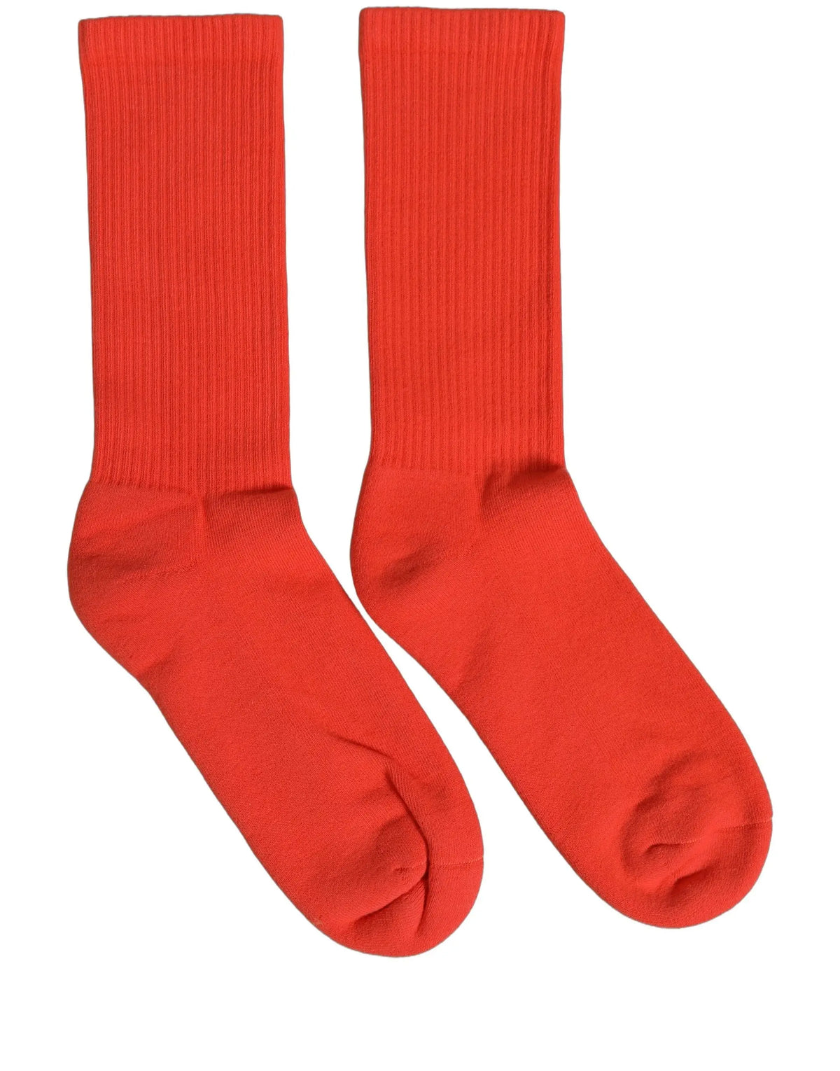 Une paire de chaussettes dolce & gabbana rouges en coton côtelé mi-mollet pour femme avec un design orange vibrant et sans couture