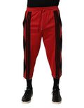Pantalon rouge dolce & gabbana avec panneaux latéraux noirs brodés et taille à cordon pour un style décontracté