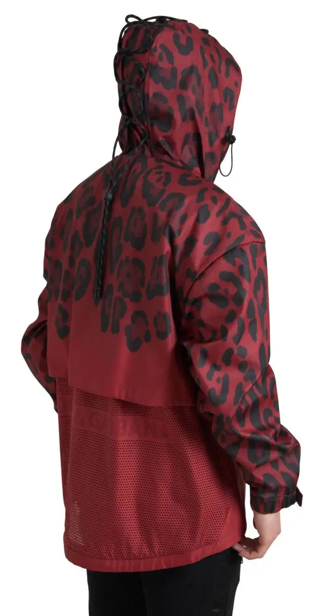 Dolce & gabbana veste imperméable à capuche rouge léopard avec panneaux en mesh et cordons noirs