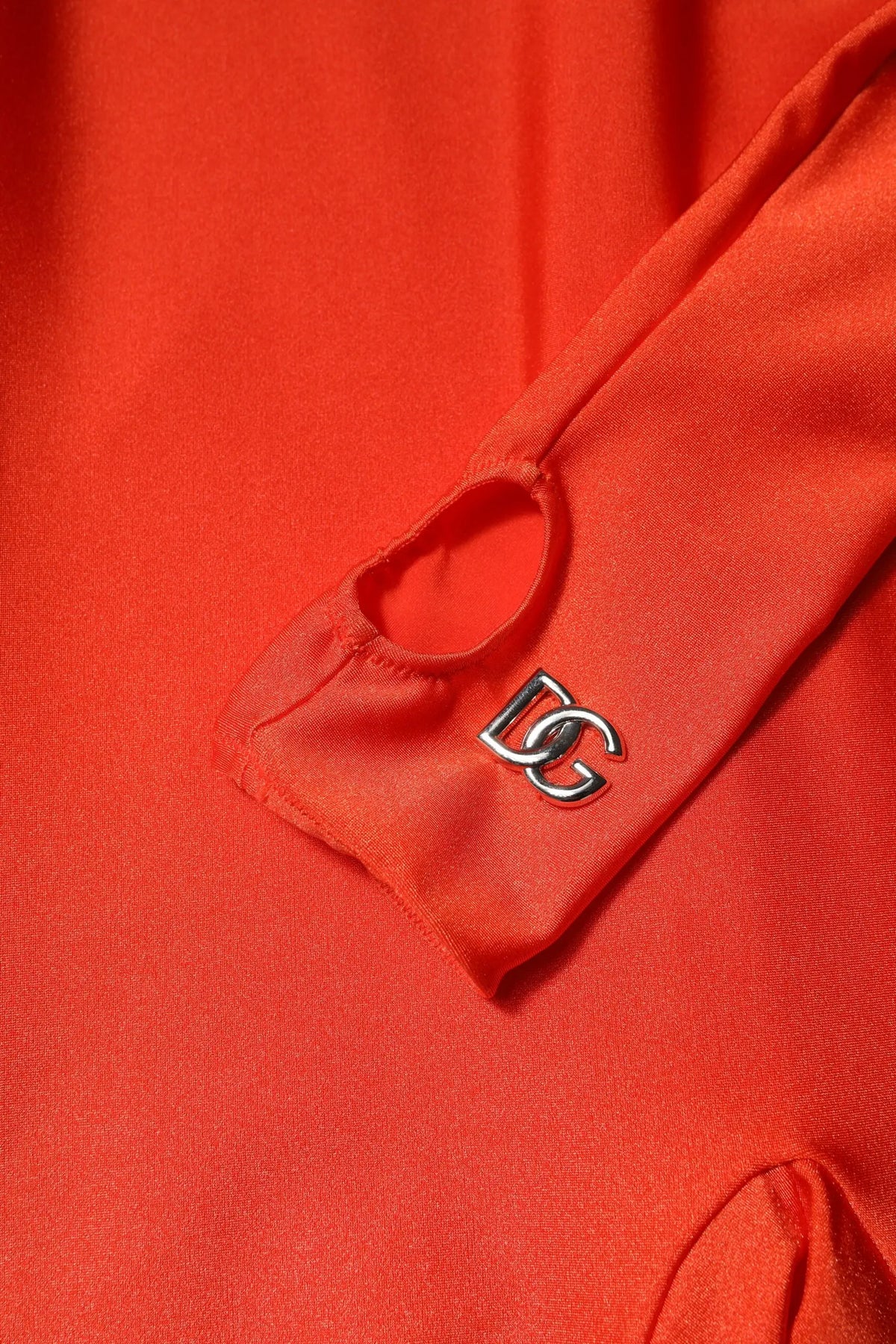 Manche de robe bodycon en nylon rouge dolce & gabbana satinée orange avec épingle logo dc argentée