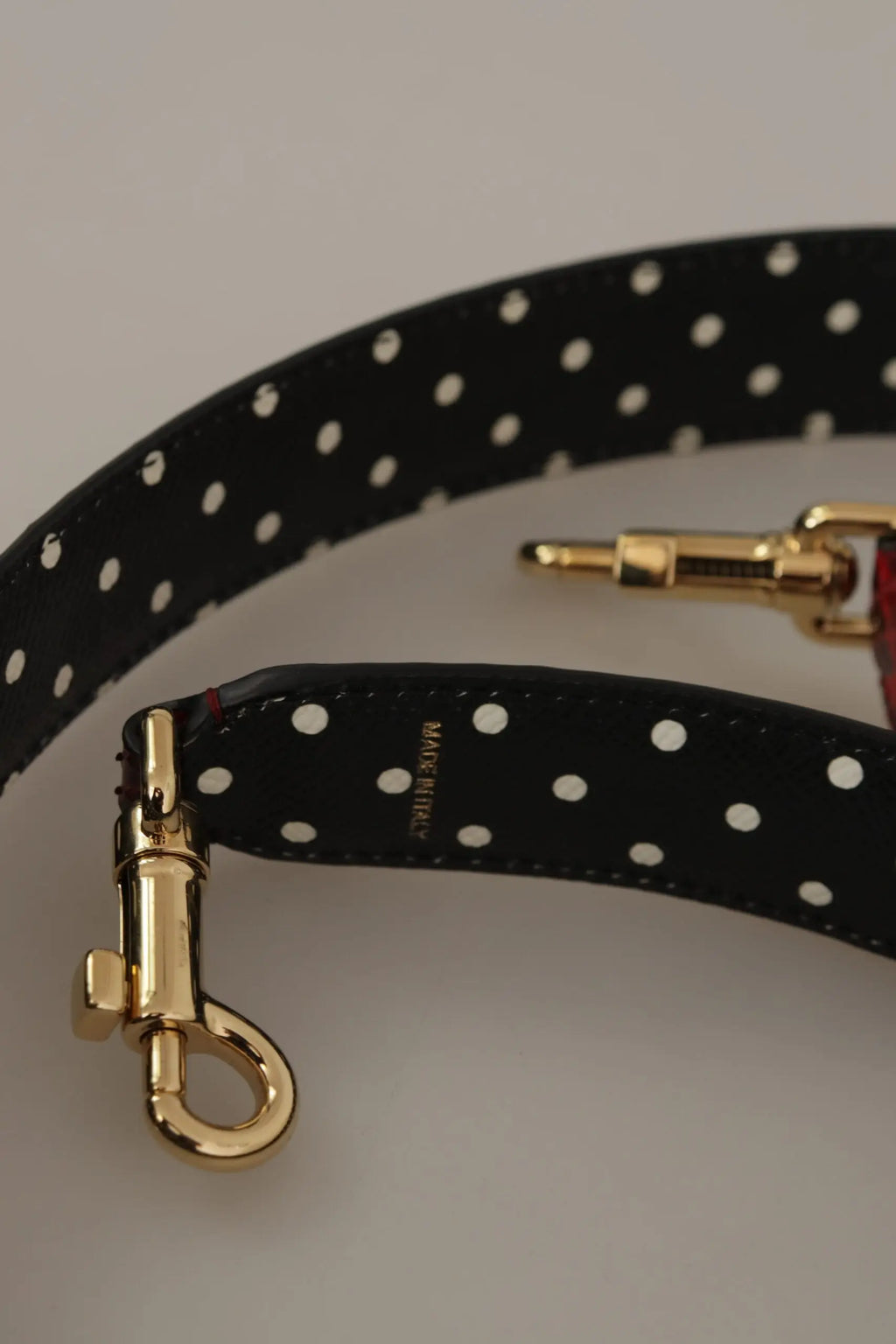 Strap d’épaule réversible dolce & gabbana en python rouge avec bande en cuir noir à pois blancs et métal doré