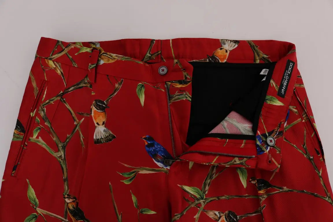 Pantalon rouge dolce & gabbana en soie avec imprimé oiseau et branche vif sur tissu texturé