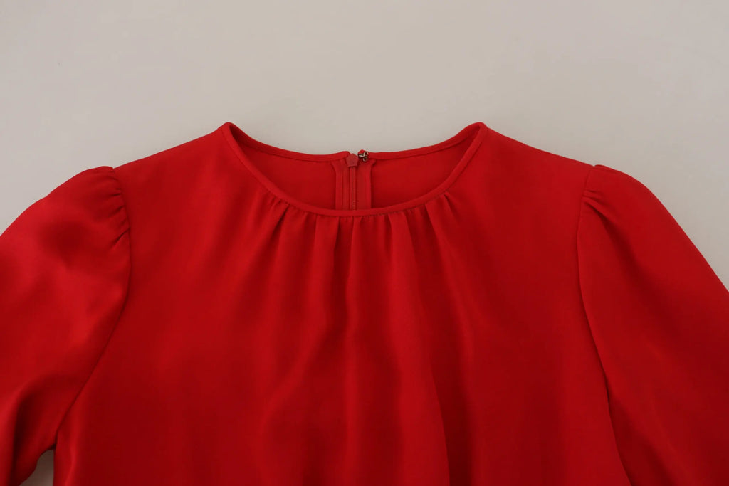 Robe rouge en soie dolce & gabbana coupe fourreau avec manches bouffantes et encolure froncée