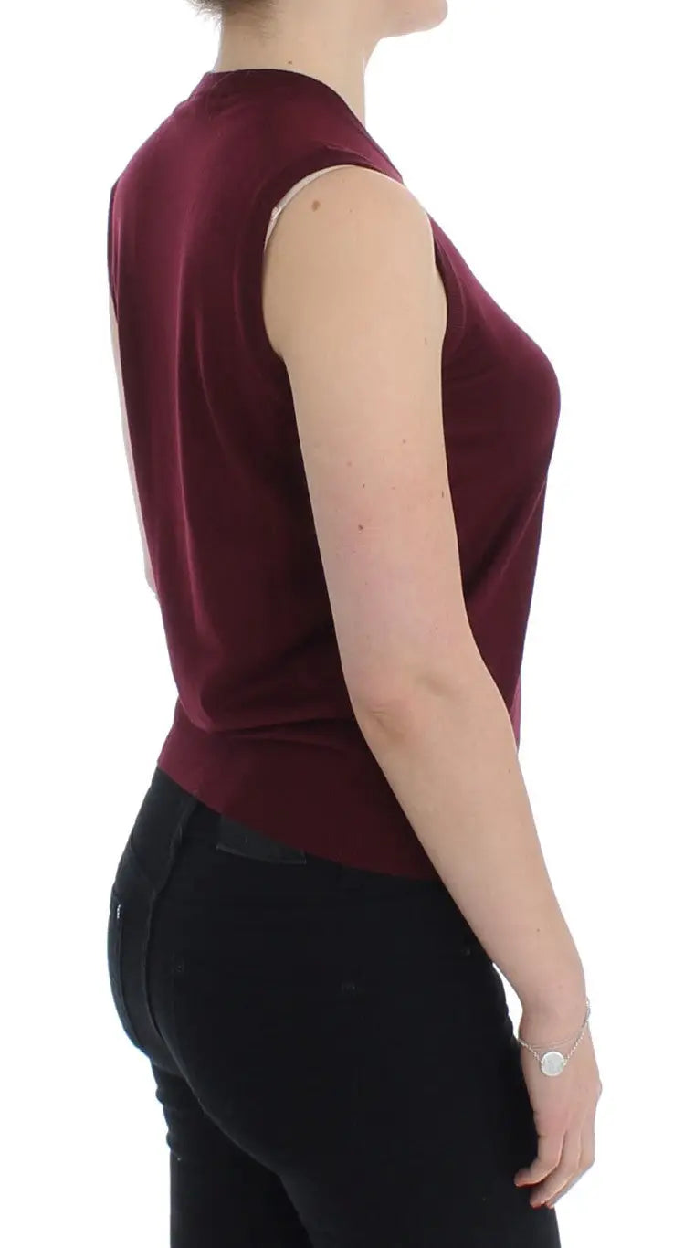 Dolce & gabbana veste rouge sans manches en satin avec une coupe ajustée et un col rond