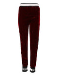 Joggers en velours rouges dolce gabbana en viscose avec ceinture et poignets rayés noir et blanc et logo DG sur les côtés