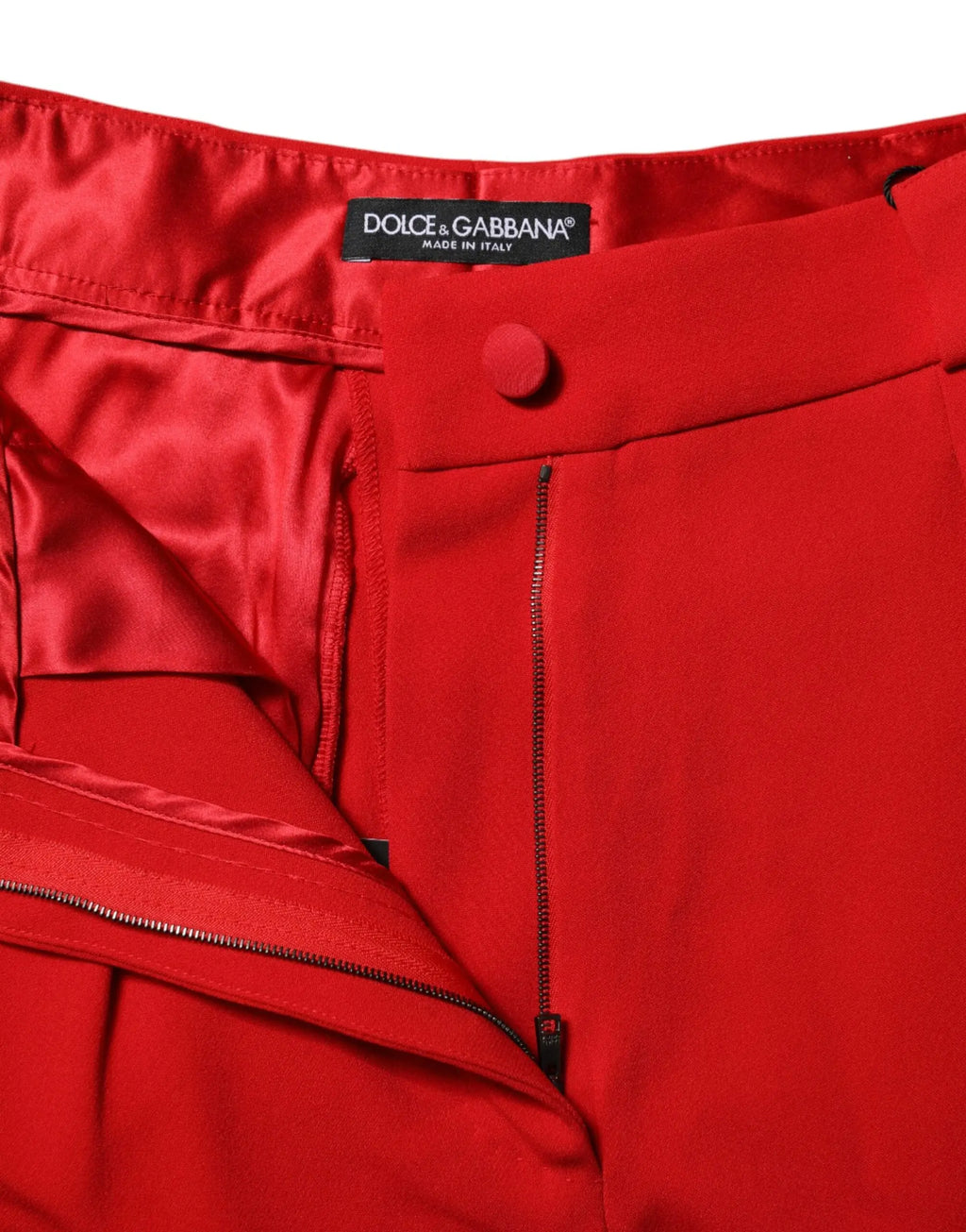 Pantalon rouge en viscose dolce & gabbana taille haute coupe fuselée avec fermeture boutonnée et zips visibles