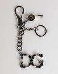 Porte-clés dolce & gabbana en laiton argenté avec chaîne noire, motif crâne et logo dg en cristal