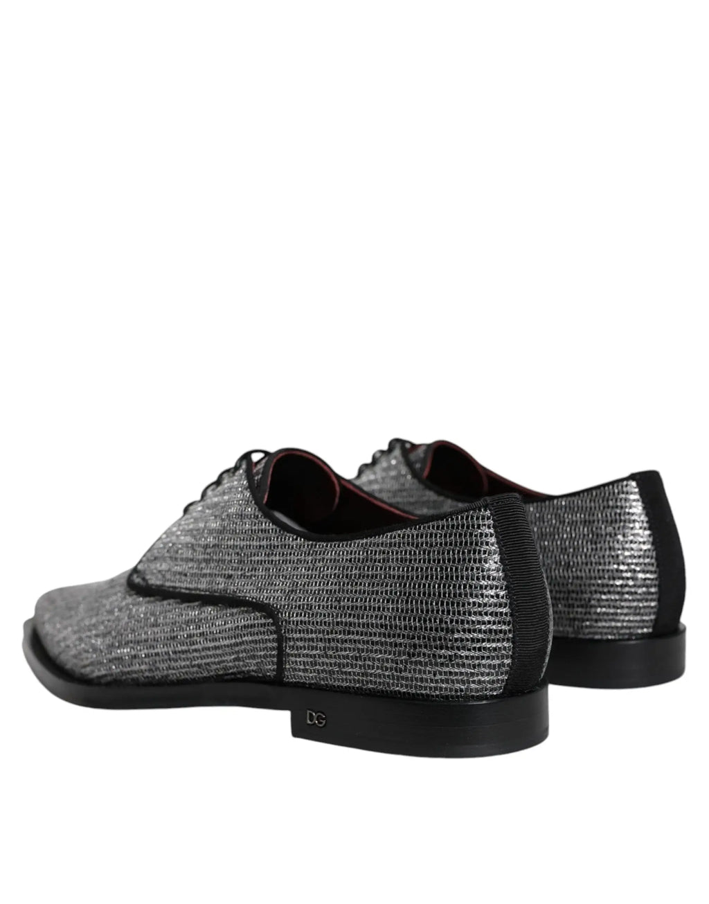Chaussures derby formelles dolce & gabbana en cuir argent texturé avec accents noirs et design moderne élégant