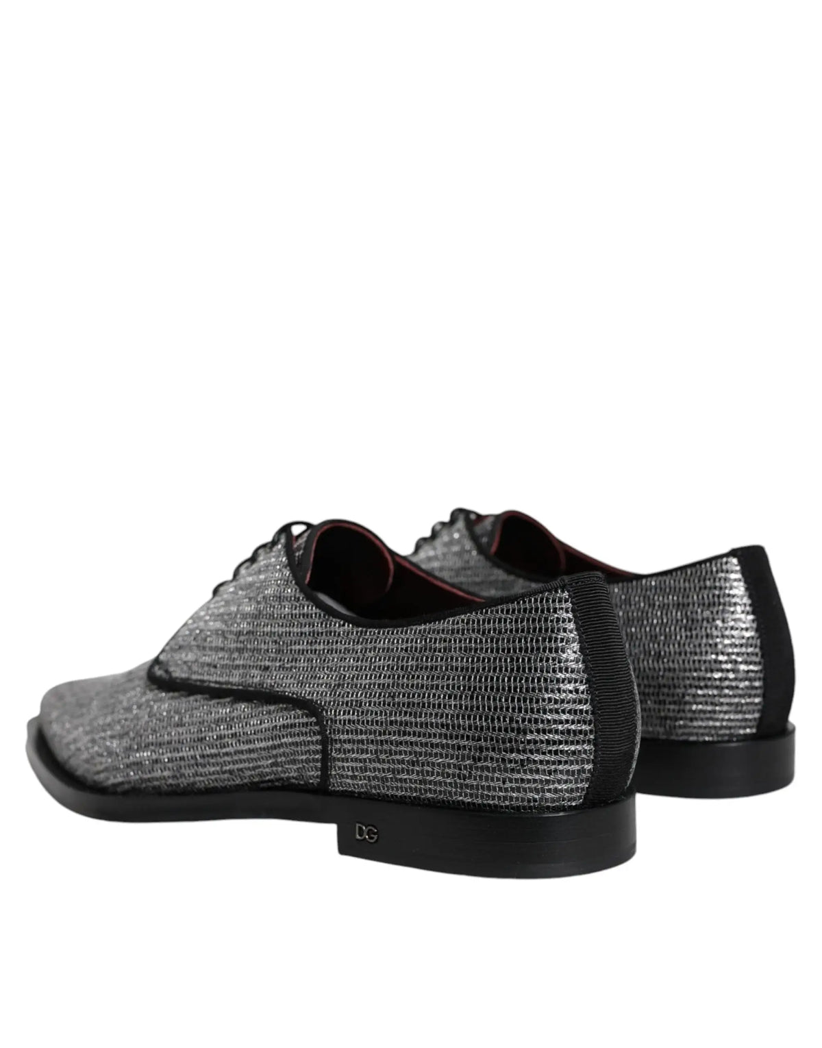 Chaussures derby formelles dolce & gabbana en cuir argent texturé avec accents noirs et design moderne élégant